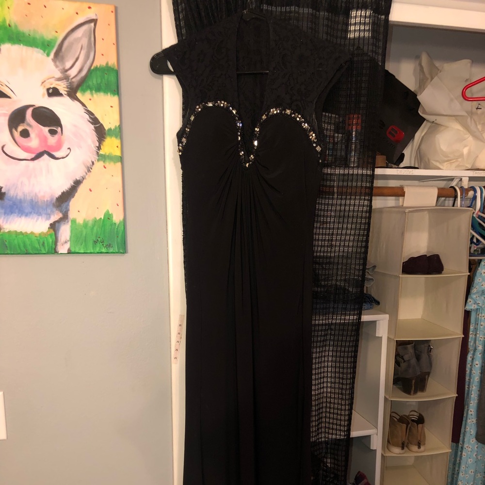Black prom dress with a Queen Anne/Jewel neckline.